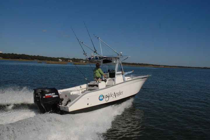 a small boat in a body of water