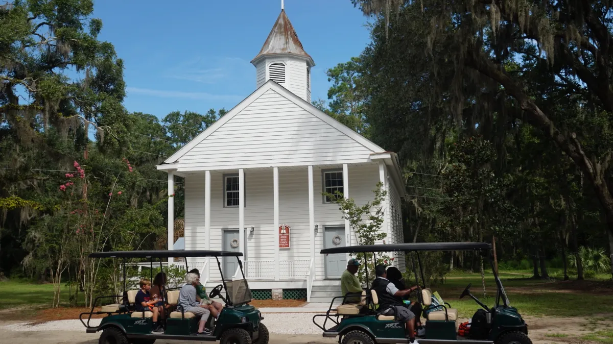 a motorcycle is parked in front of a house