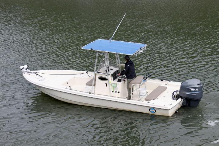a small boat in a body of water